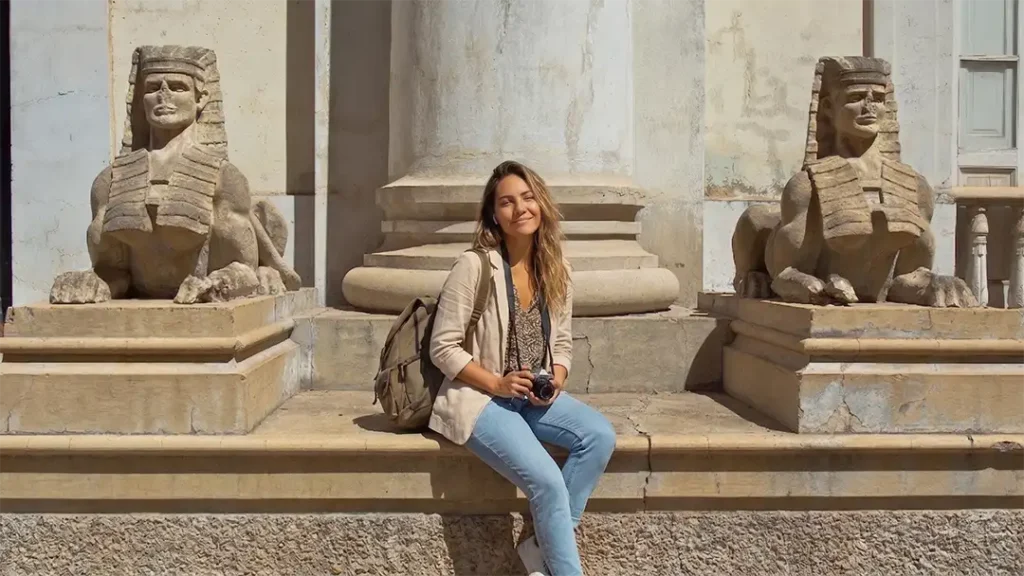 A traveller enjoying an immersive audio experience at the Masonic temple in Santa Cruz de Tenerife.