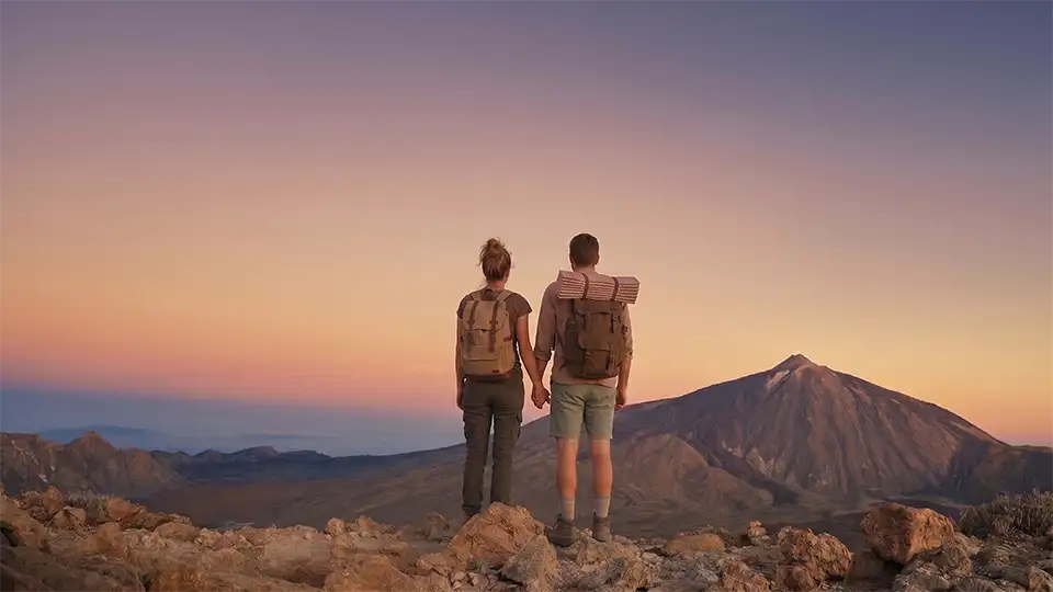 A couple enjoying an immersive experience in Teide National Park, Tenerife